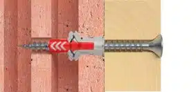 Comment fixer des charges lourdes au mur avec des chevilles pour parpaing creux